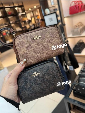 美國Coach胖胖手拿零錢包