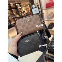 美國Coach胖胖手拿零錢包